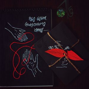 A black romantic gift set for gift including notebook and envelope