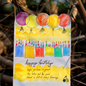 This beautiful and unique birthday card is sure to be a hit with anyone celebrating their special day! The card is handpainted with a bright yellow background and features a playful pattern of festive stripes, stars, and polka dots. Perfect for any special occasion, this handpainted birthday card is a thoughtful way to let someone know you care!